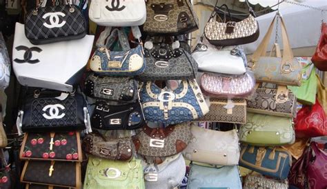 is it illegal to buy fake designer bags from china|is purchasing counterfeit bags illegal.